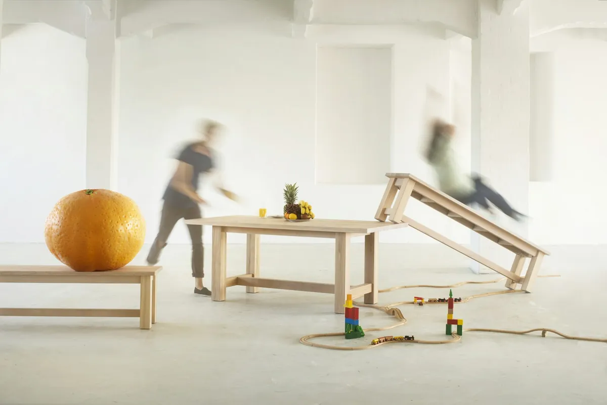 A bright indoor play space with soft climbing shapes
