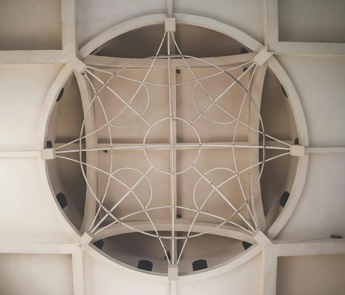 A rope climbing structure seen from below