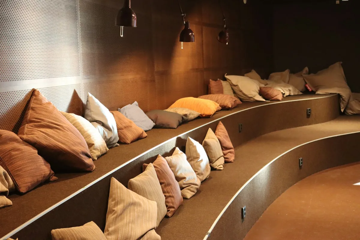 A long bench lined with soft cushions