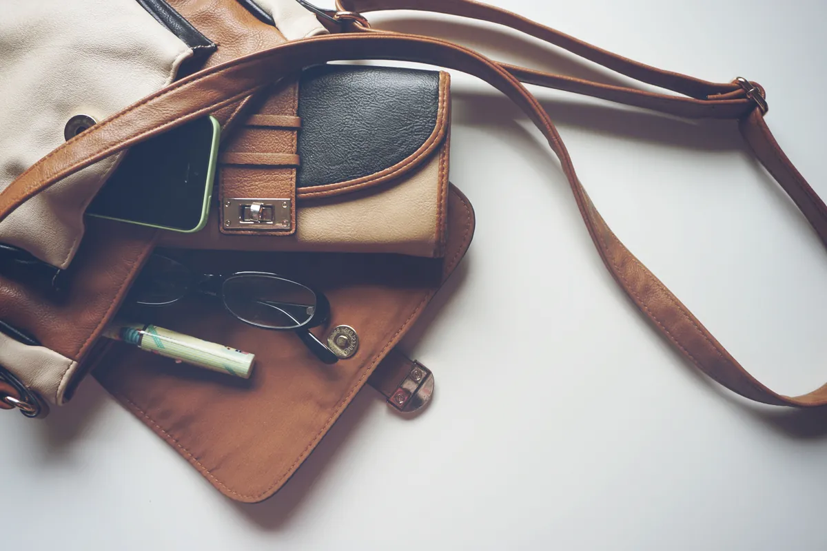 A shoulder bag packed with everyday essentials