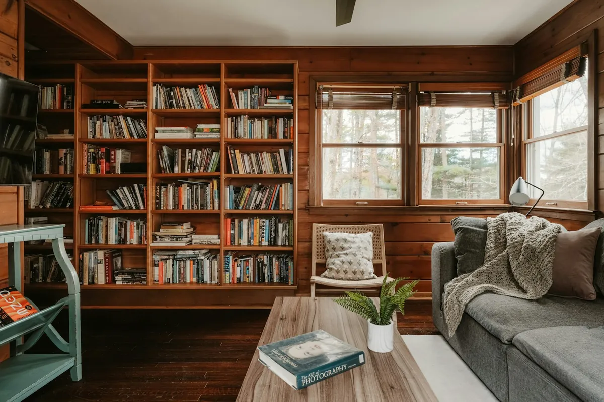 A quiet room with bookshelves and soft seating