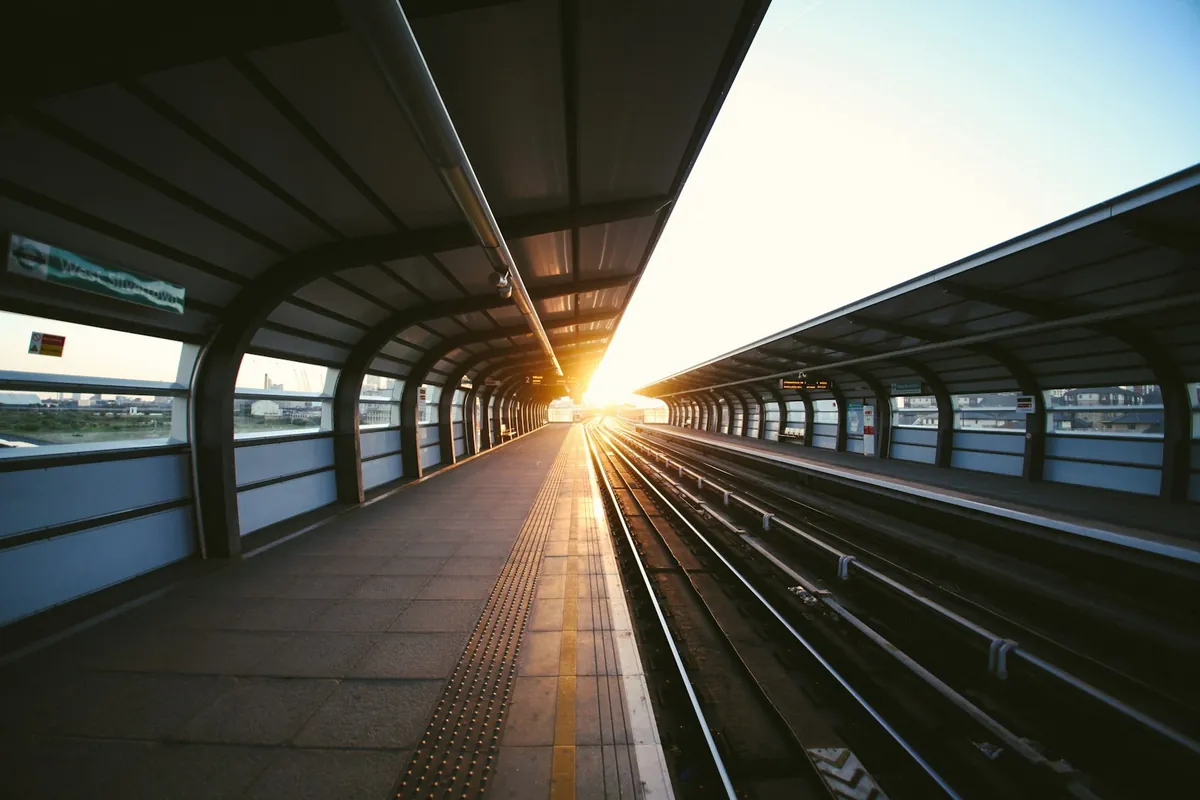 An empty station platform stretching into the distance