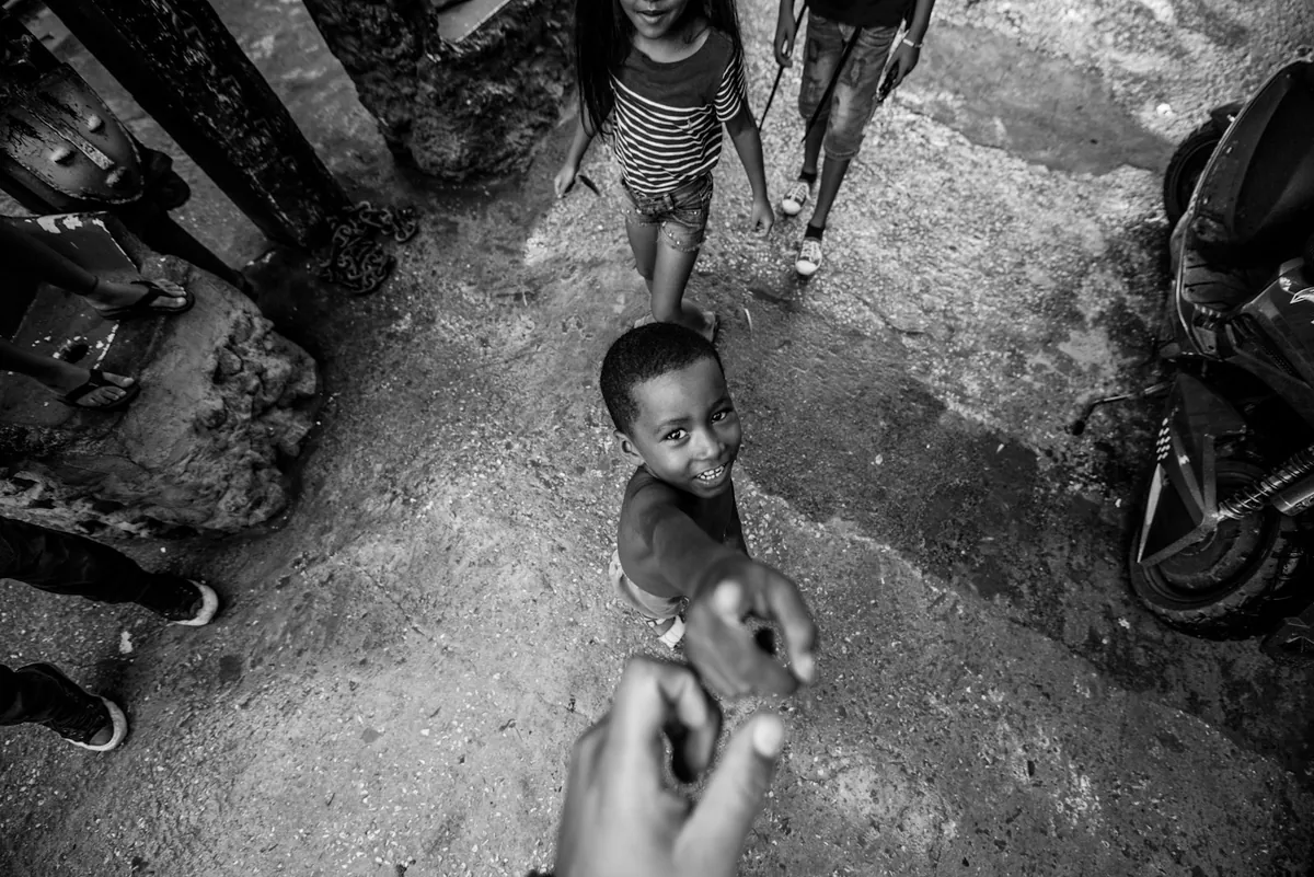 Children playing together in an open outdoor space