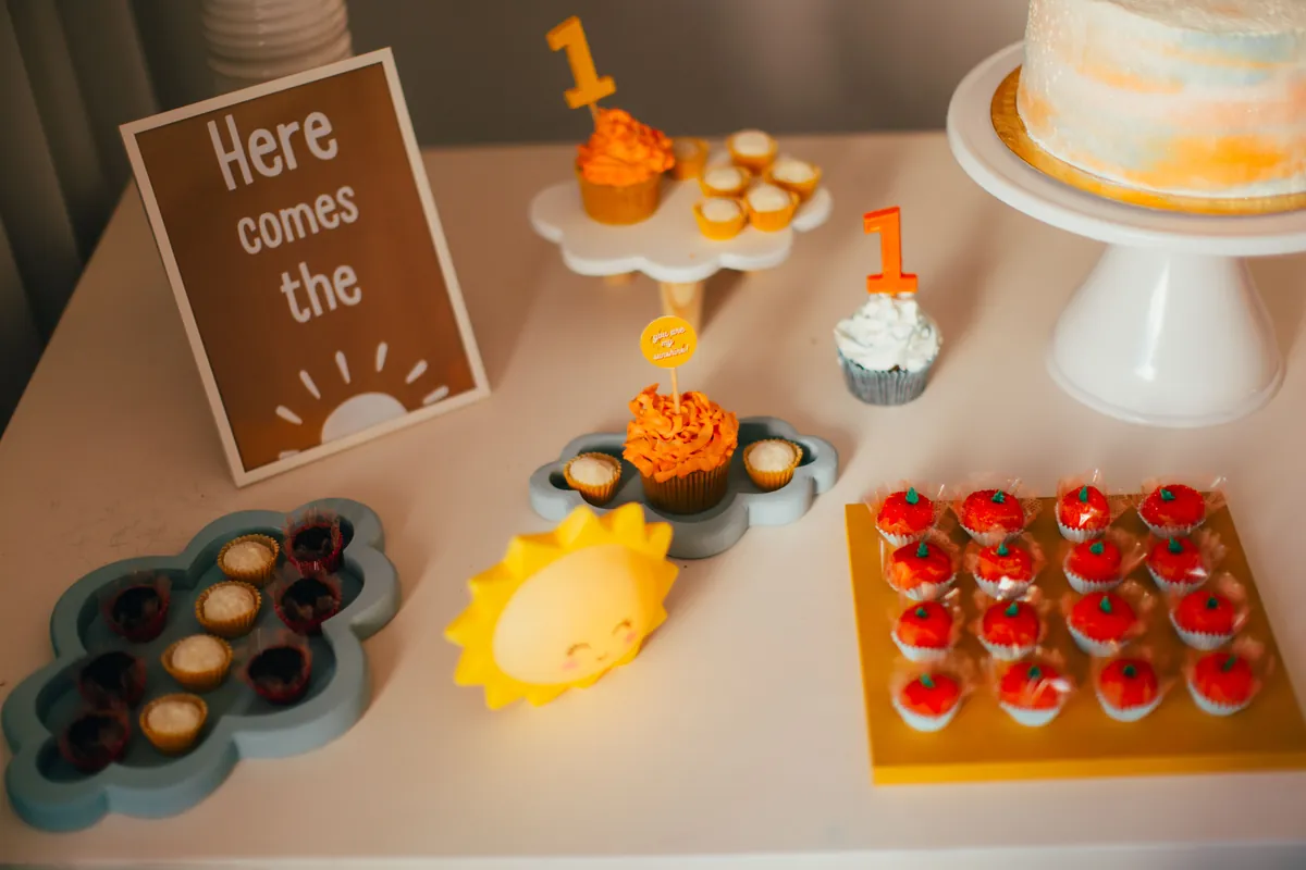 Small party foods laid out in trays on a table